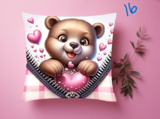 a small baby is holding a teddy bear