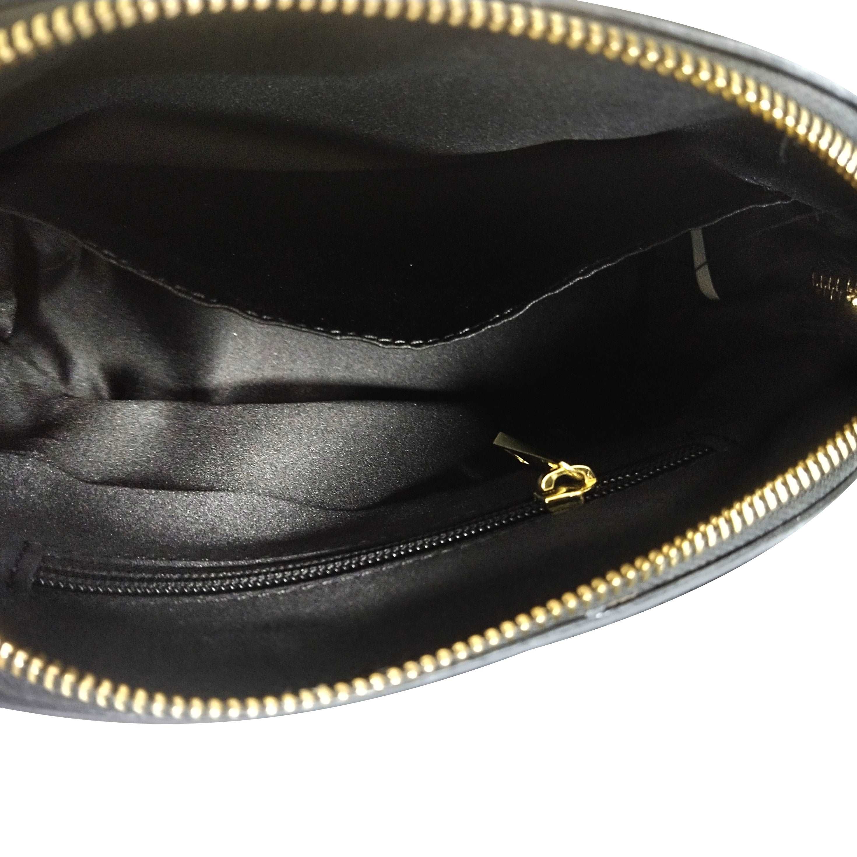 a black leather purse with a black shoe