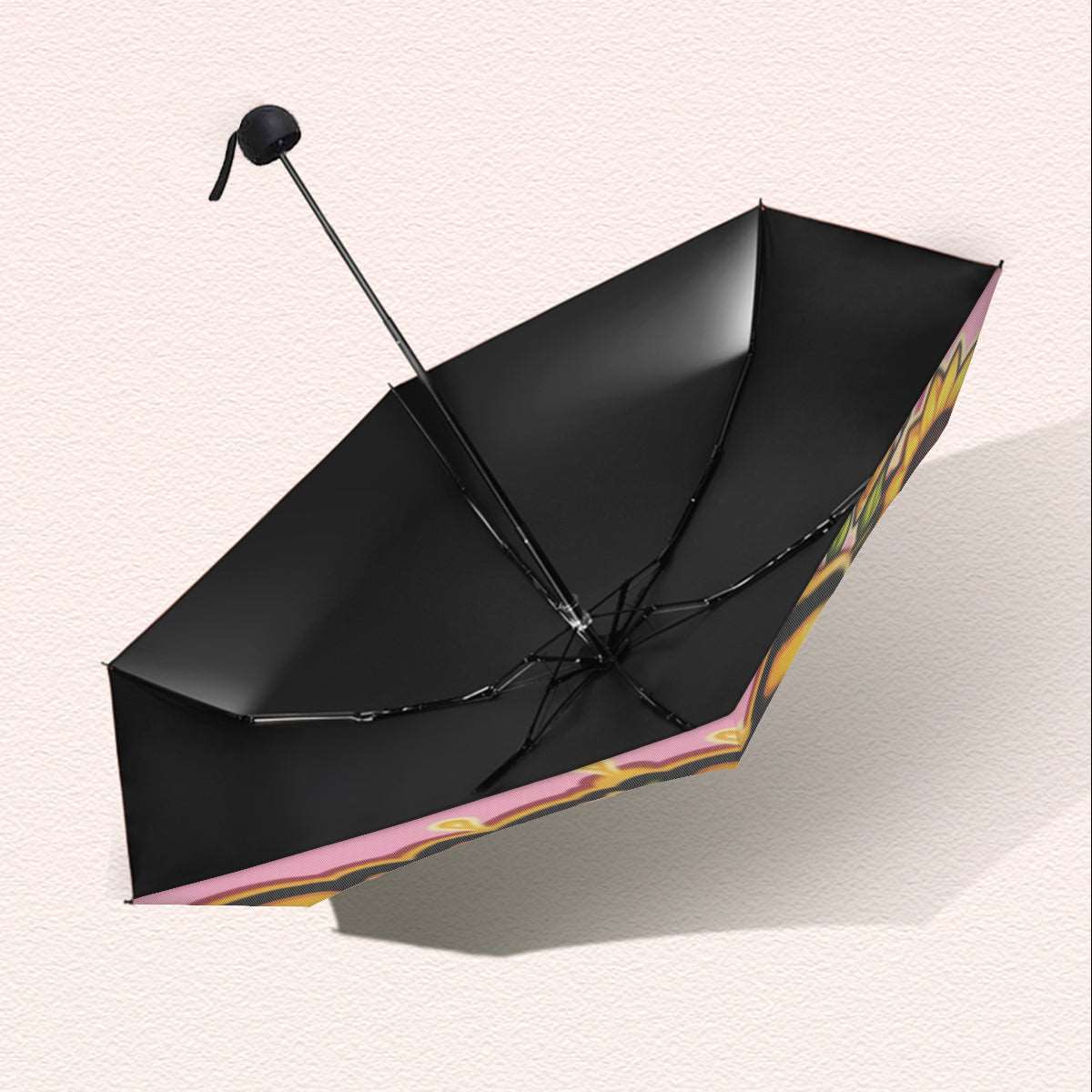 a black umbrella that is in the snow