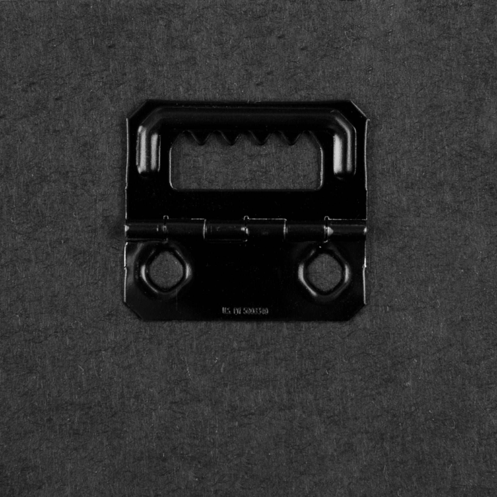 a black and white photo of a suitcase 