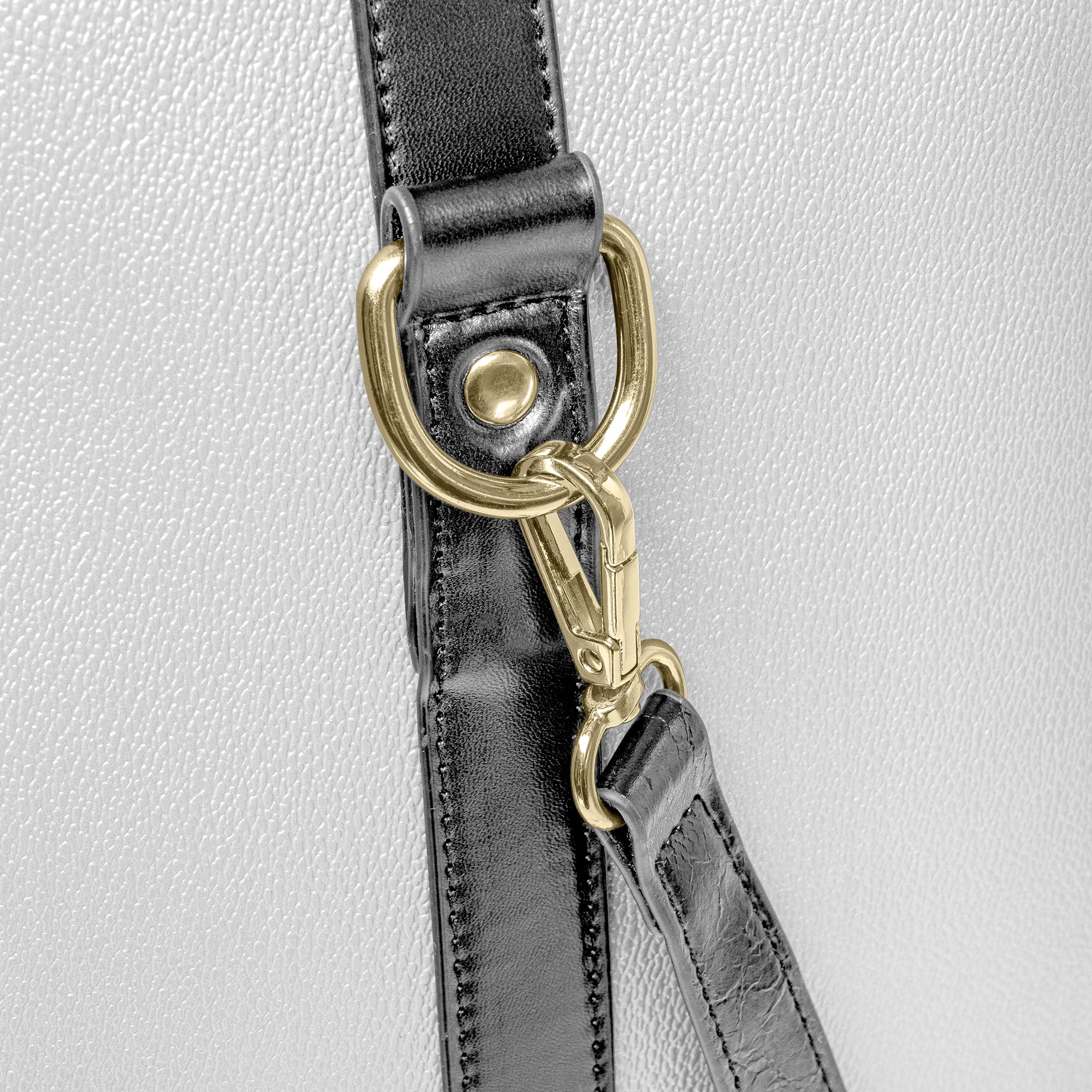 “Western-inspired women’s duffel bag displayed outdoors.”