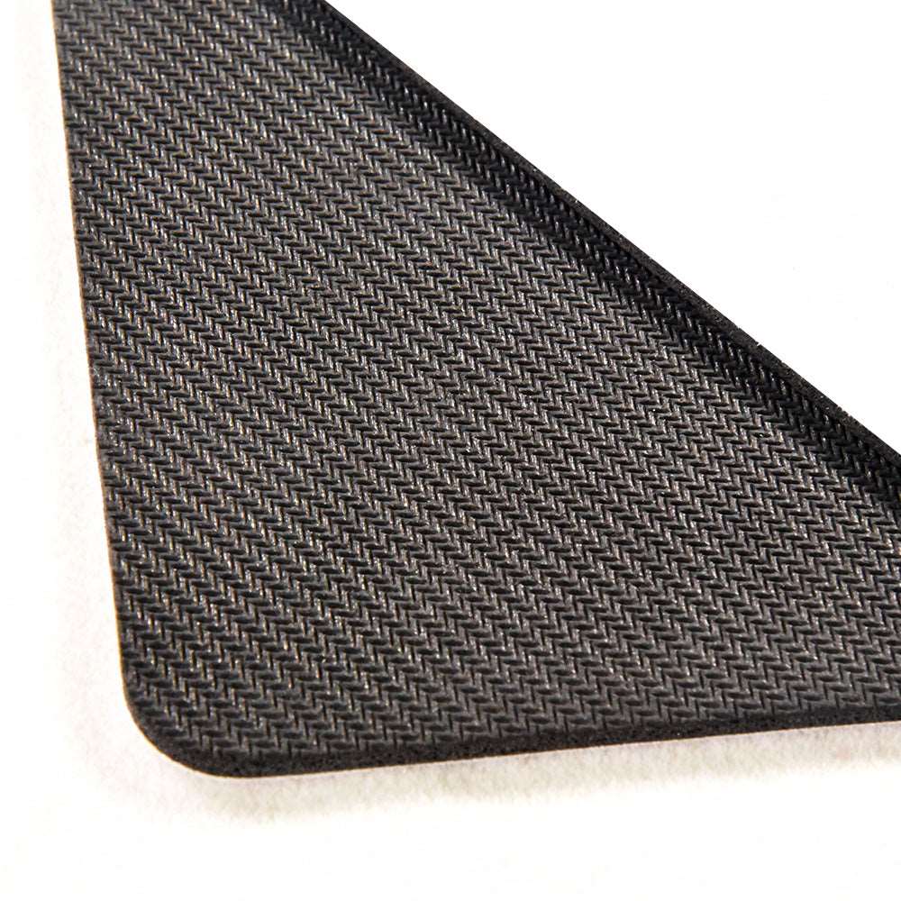 a close up of a tie on a black suit 