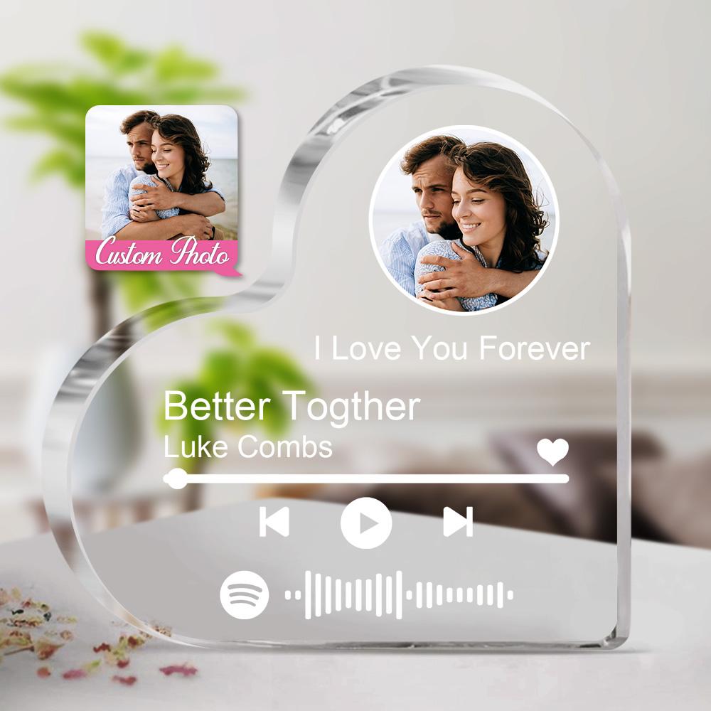 Personalized heart-shaped acrylic Spotify music photo frame gift, clear with a photo and Spotify code.